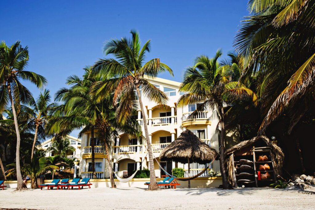 Where to stay in Belize for snorkeling The Pelican Reef Villas Resort is a great pick